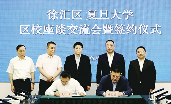 /徐军、沈权签署《党建引领教育科技人才协同发展战略合作框架协议》